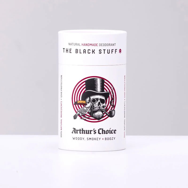 Deodorant container labeled 'The Black Stuff' with a skull and top hat design on a white background