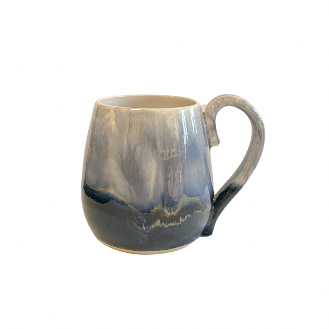 Large curved stoneware mug. Hand thrown in blue ombre glaze