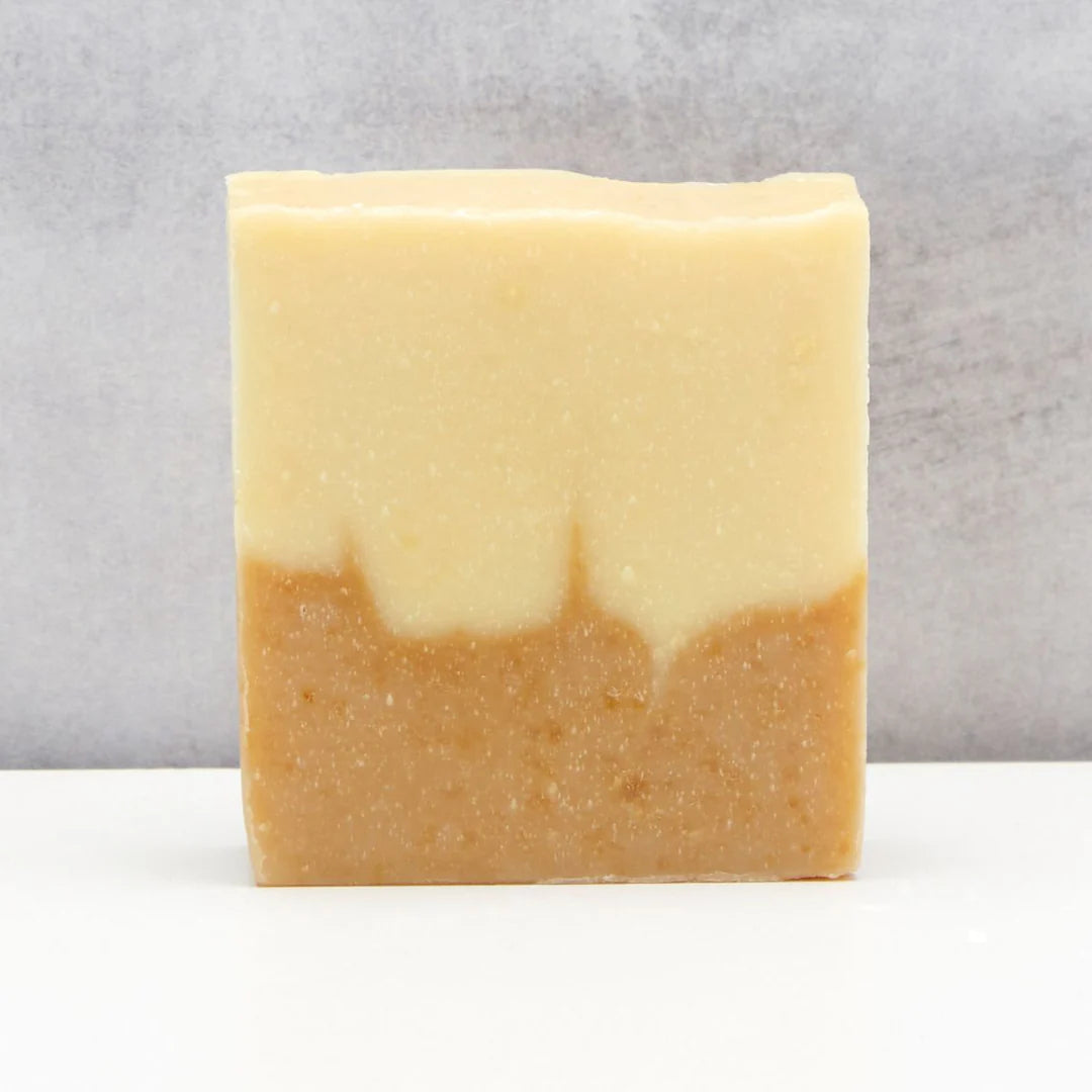 Two-tone soap bar on a gray background