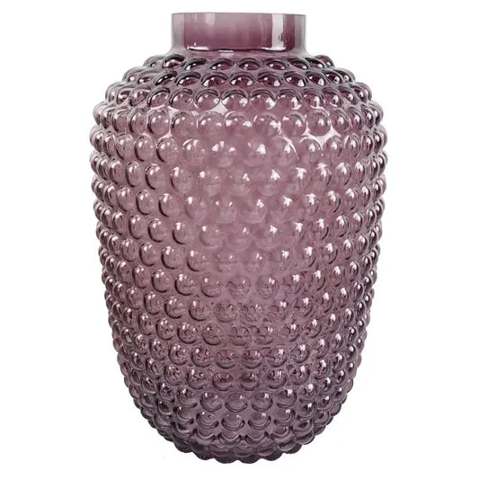 A mulberry purple glass vase with a bubble embossed pattern.