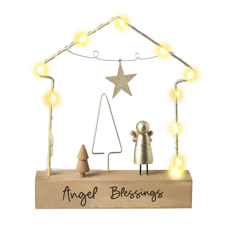 Decorative scene with angel, tree, and star on a wooden base with LED lights.