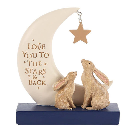 Decorative figurine with rabbits and a moon, featuring the text 'Love you to the stars and back'.