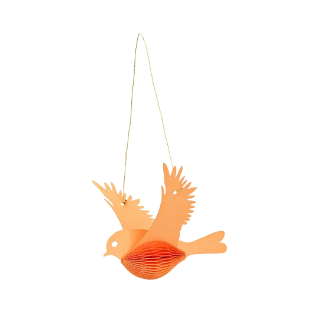 Orange paper bird decoration hanging on a white background