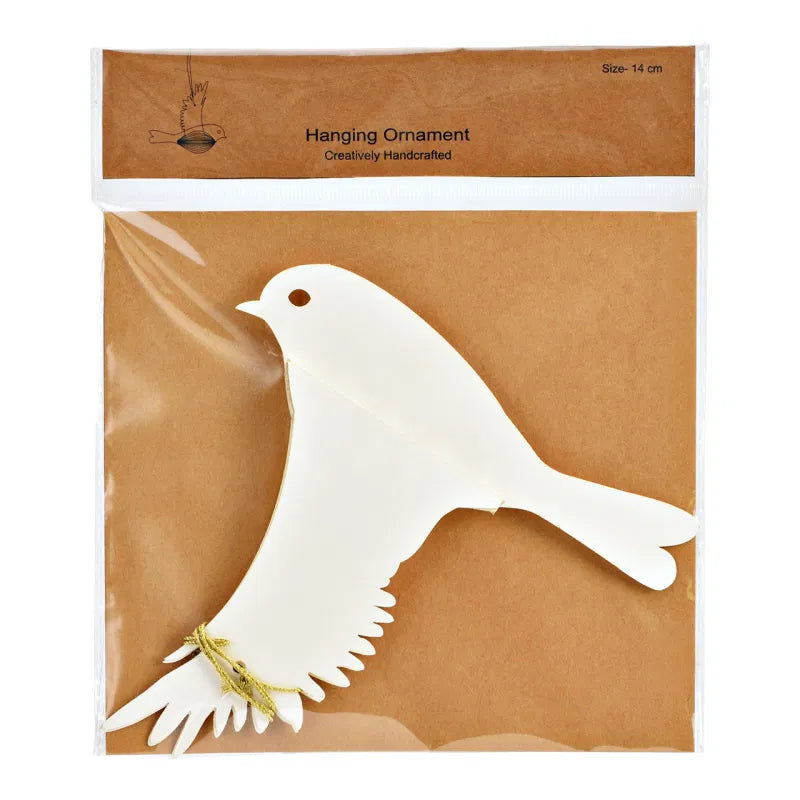White dove hanging ornament on brown packaging with text