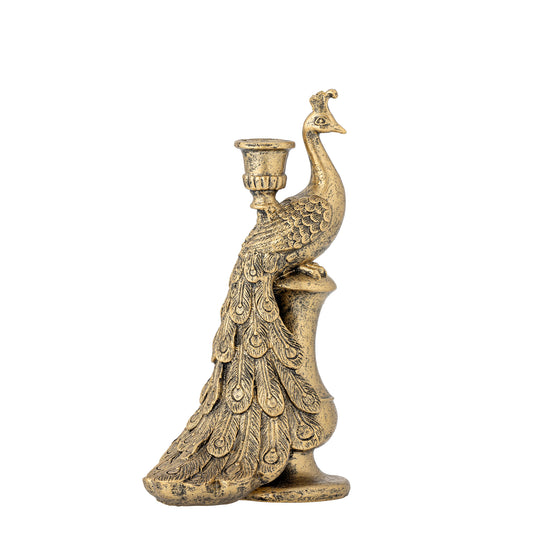 Resin gold coloured peacock candle holder on a white background