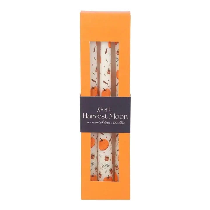 Set of 3 Harvest Moon candles in an orange box with a purple label.
