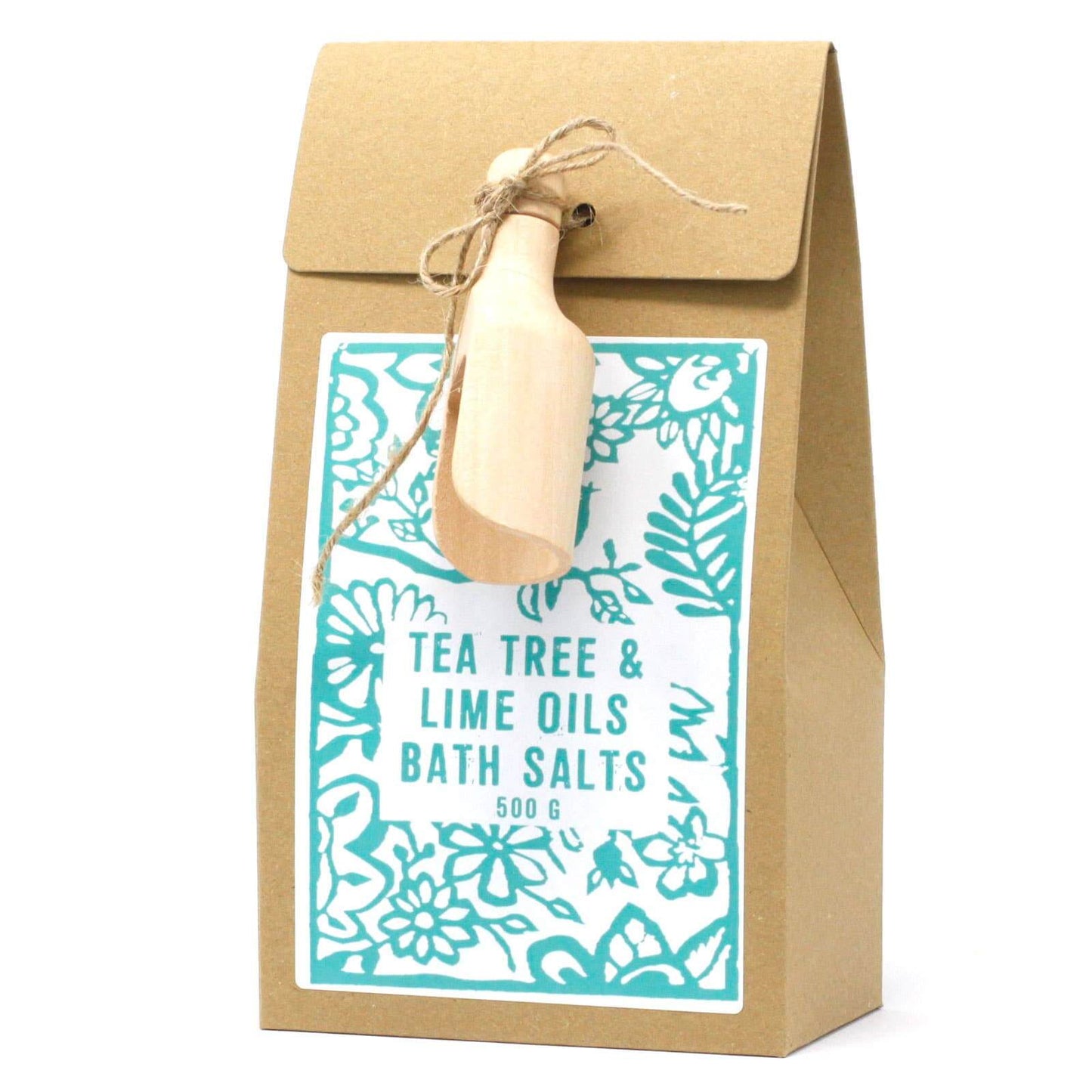 A package of Himalayan Tea Tree & Lime Oils Bath Salts with a wooden scoop attached to the top, presented in a brown paper bag with a floral pattern and a kraft label.