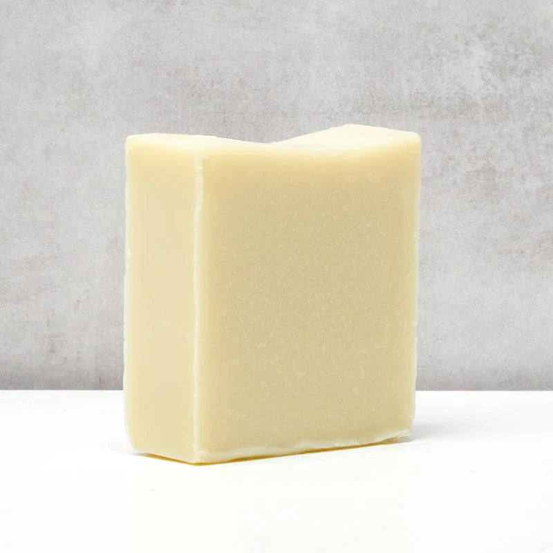 Bar of The Black Stuff Dublin Rose soap on a gray background
