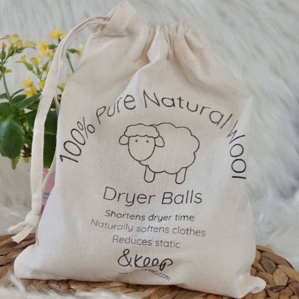 Bag of dryer balls with a sheep illustration and text about benefits on a soft white background.