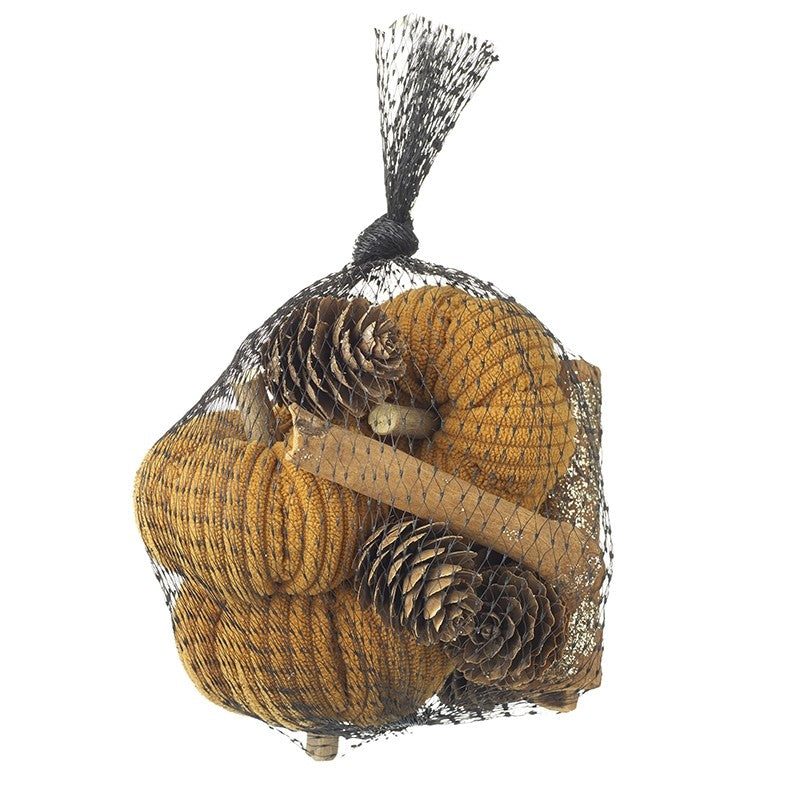 Bag of pine cones and twigs on a white background
