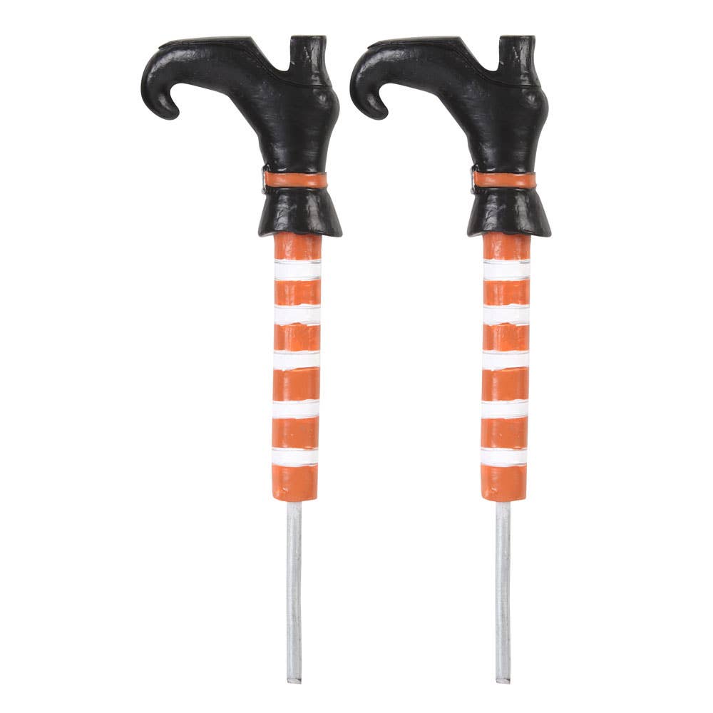 Set of 2 Witch Leg Plant Pot Ornaments with orange and white stripped legs and black boots. Side view