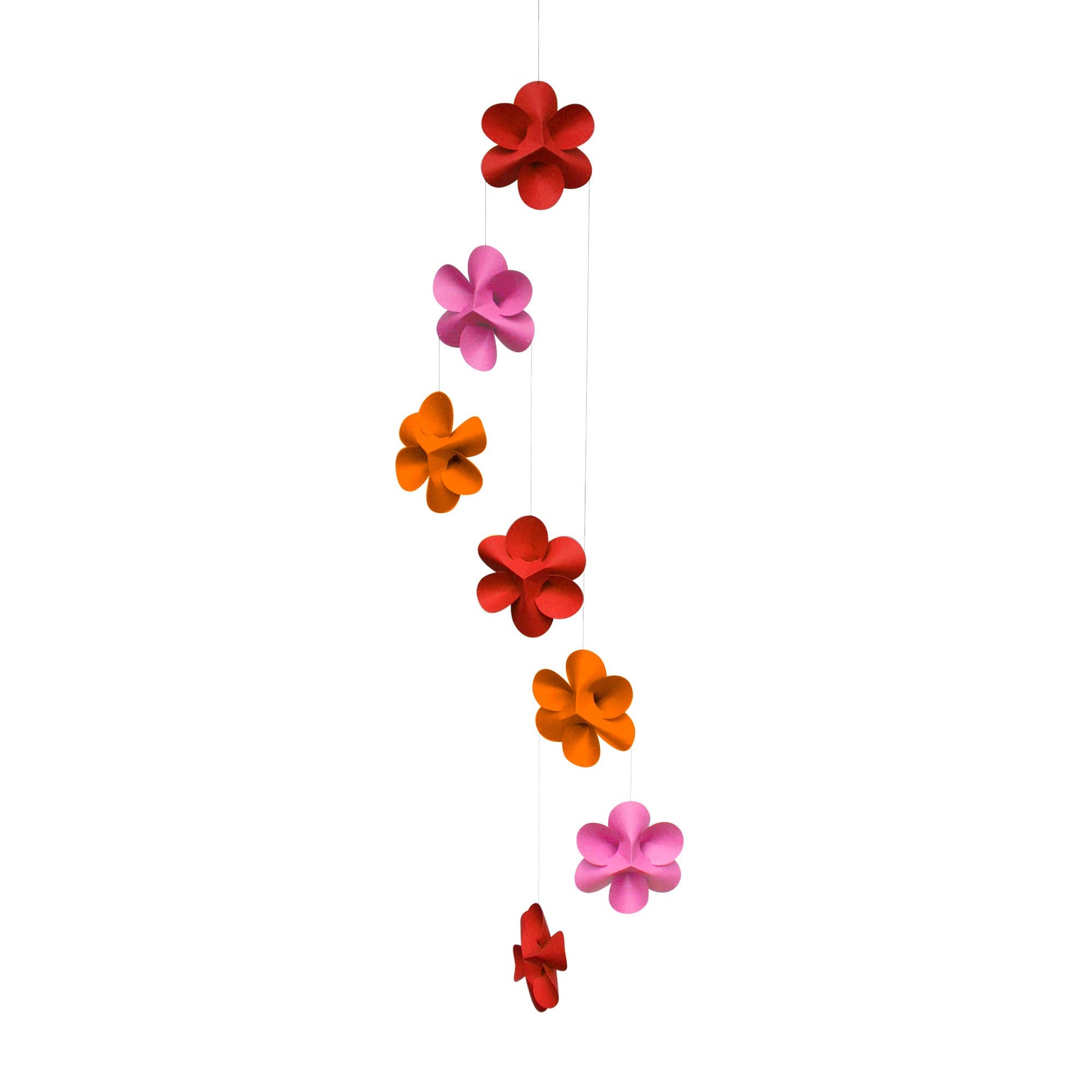 Paper flower mobile in red orange and pink on a white background