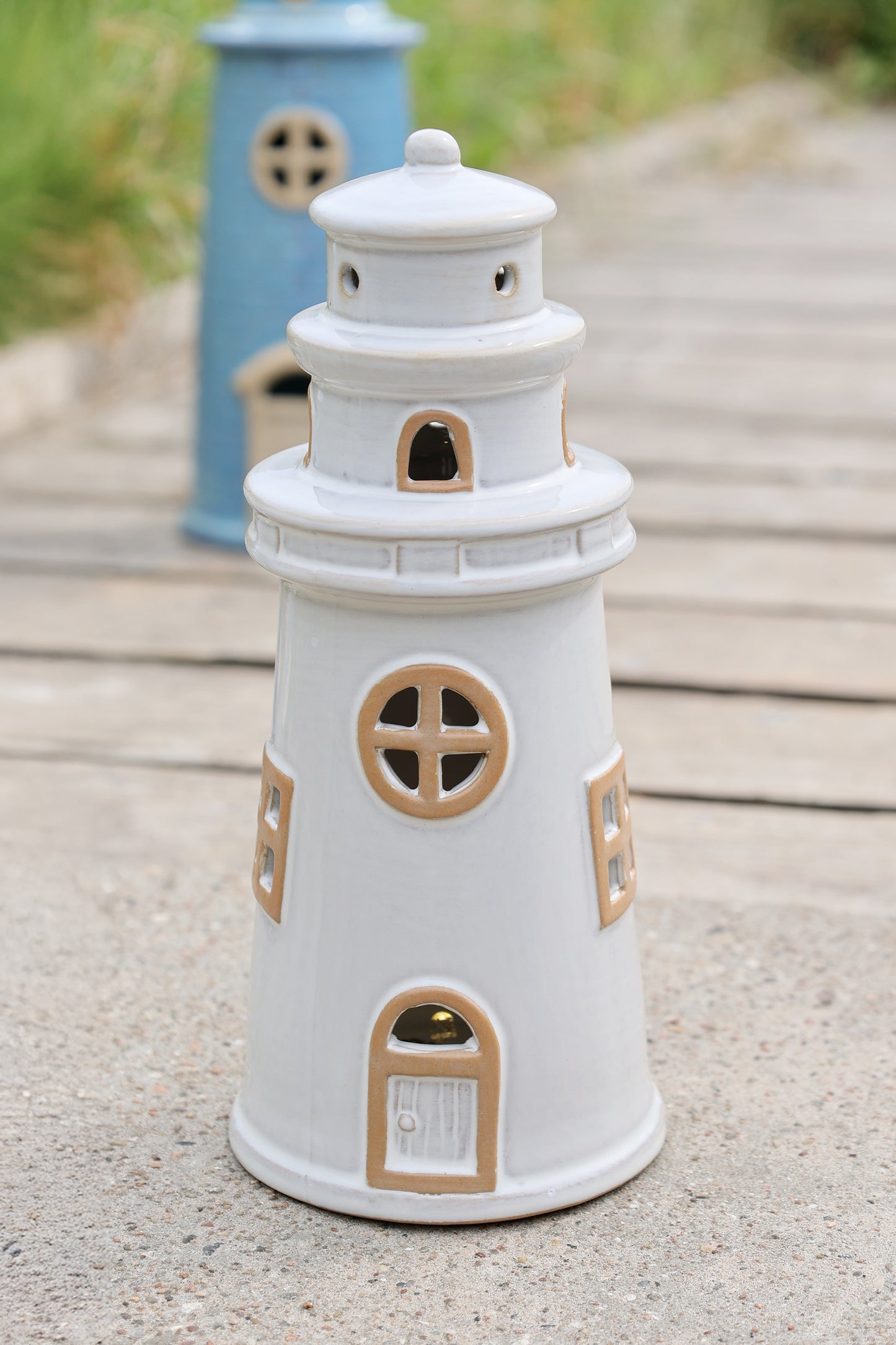 LED cream lighthouse on path