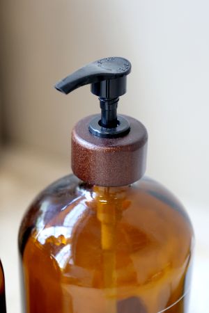 Close up of dispenser bottle top