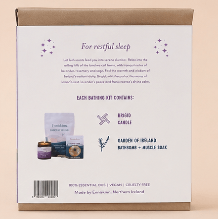 The back of a brown cardboard product box for bath products, featuring product details, descriptions, and a barcode on a light beige background.