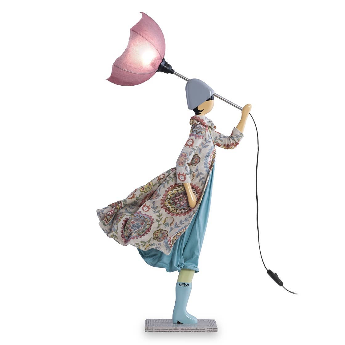 Decorative lamp shaped like a person holding a pink umbrella on a white background