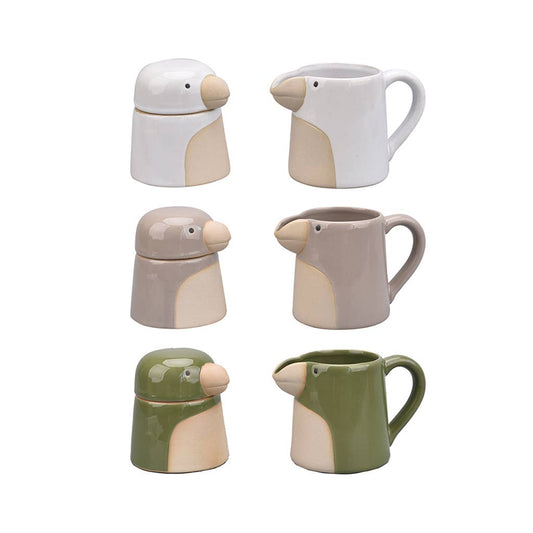 Set of six ceramic animal-shaped mugs on a white background