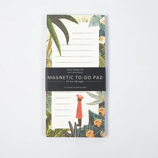 A Magnetic To-Do List pad with a tropical plant design,  bound by a black belly band with product information.