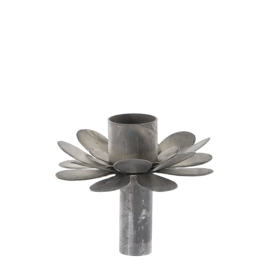 Zinc flower candle holder on white background