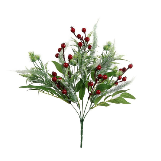 Artificial greenery with red berries on a white background
