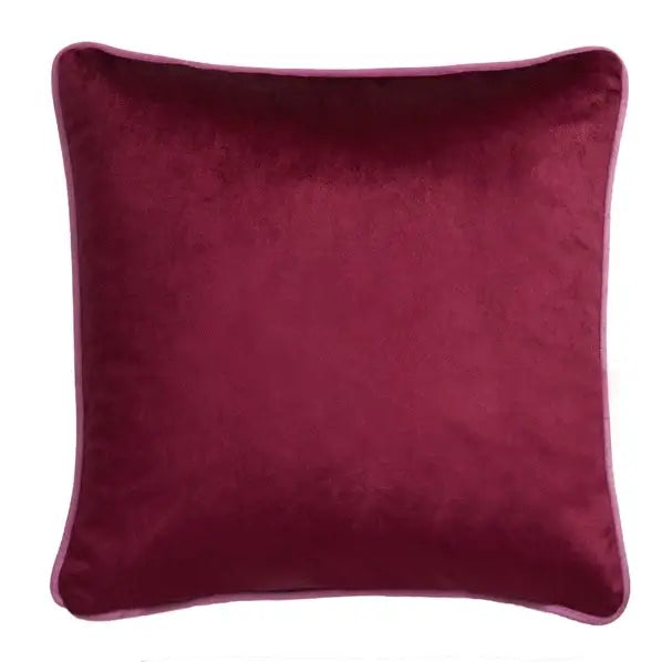 Reverse of the pink Birdity Absurdity cushion showing its plain fabric back