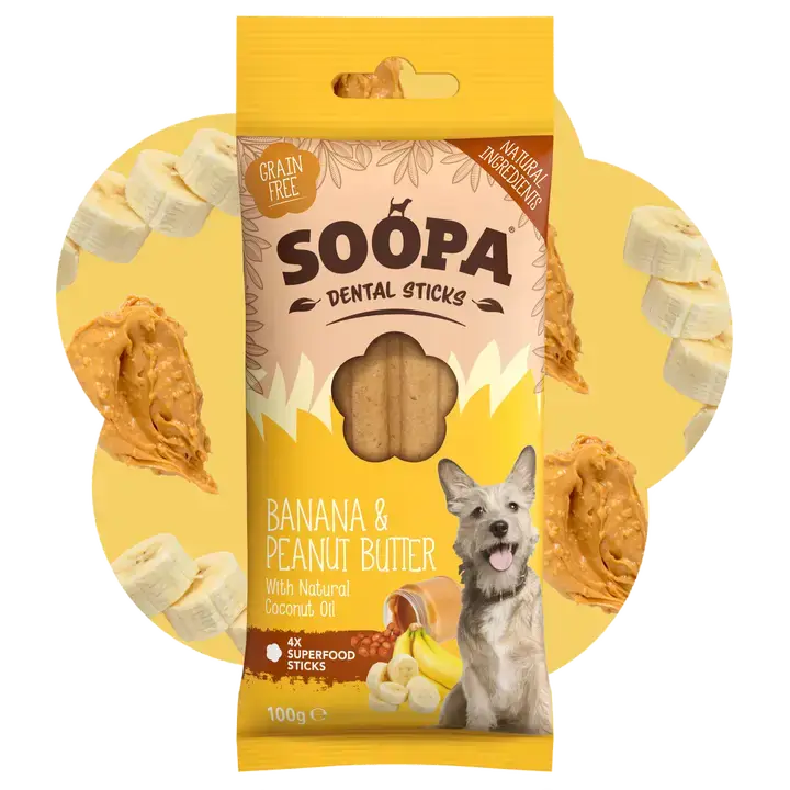 Soopa Dental Sticks packaging with banana and peanut butter illustrations on a pink background