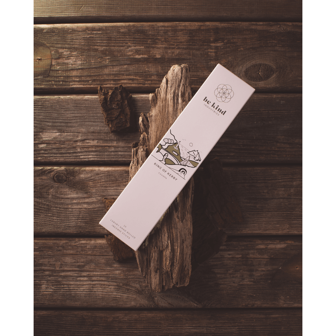 A package of Be Kind brand incense sticks, labeled 'Ring of Kerry' sitting on a rustic table