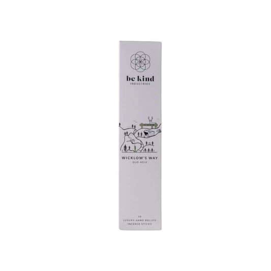 A package of Be Kind industries Wicklow's Way incense sticks. The packaging is primarily white with a graphic design featuring a house and a tree, and text detailing the product name and length.