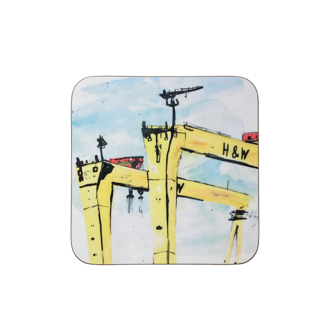 Coaster with a design of the distinctive yellow cranes of Belfast against a blue sky background