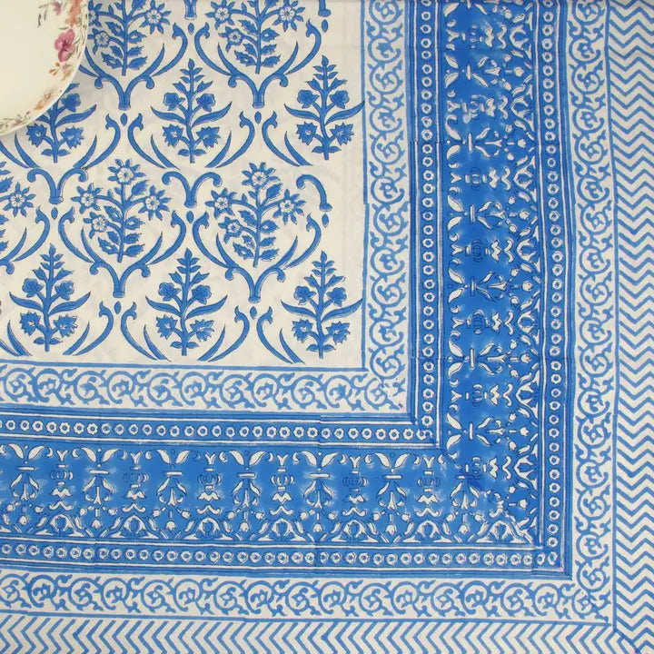 Blue and white patterned fabric with intricate designs