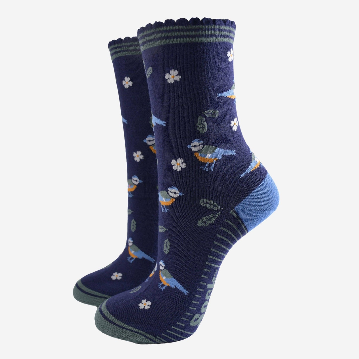 Pair of navy blue socks with bird and flower pattern on a white background