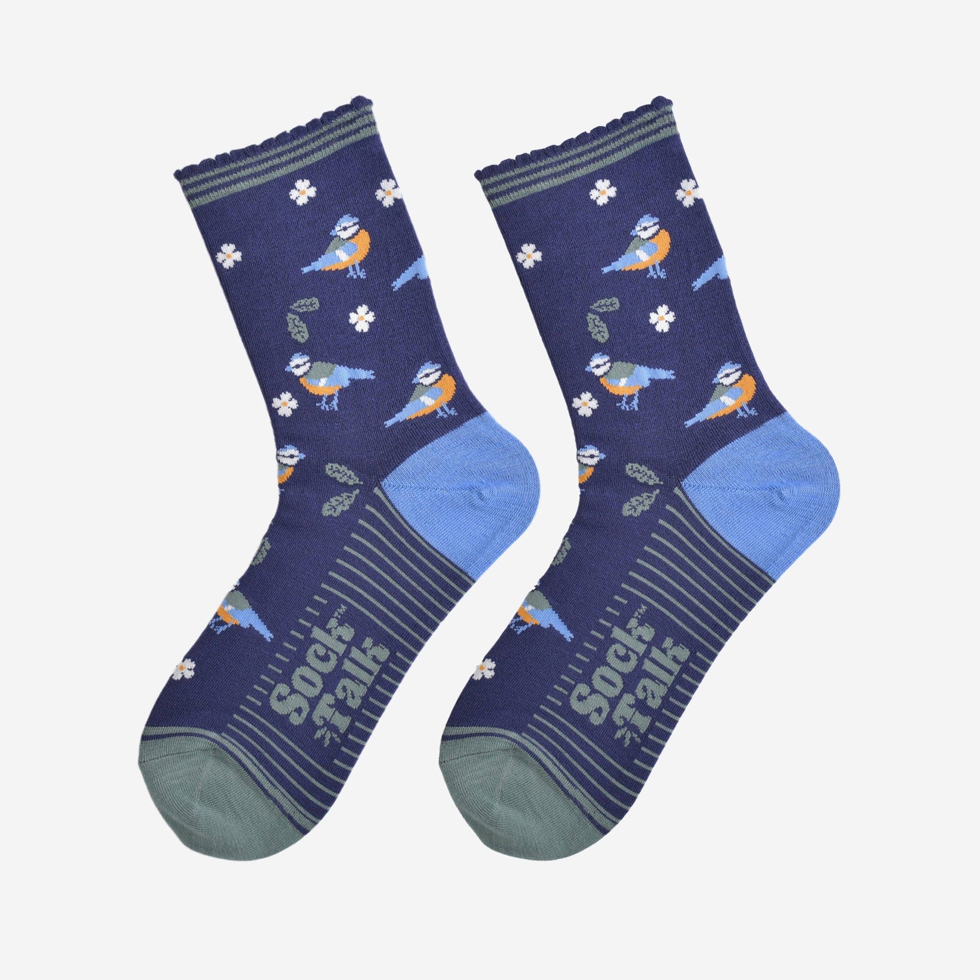 Pair of blue socks with bird pattern on a white background