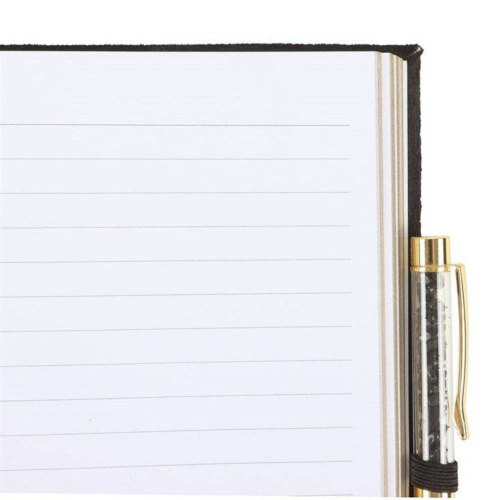 Notebook with a pen on a white background