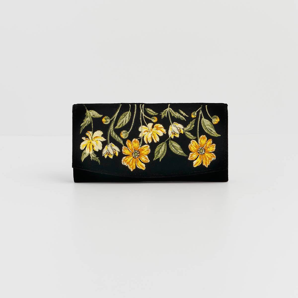 Black purse with yellow floral embroidery on a white background