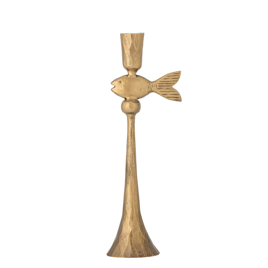 Decorative brass candle holder with fish design on a white background