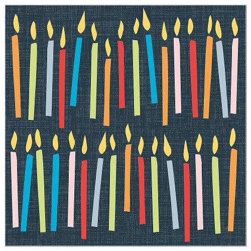 Colorful candles napkin on a dark blue fabric background