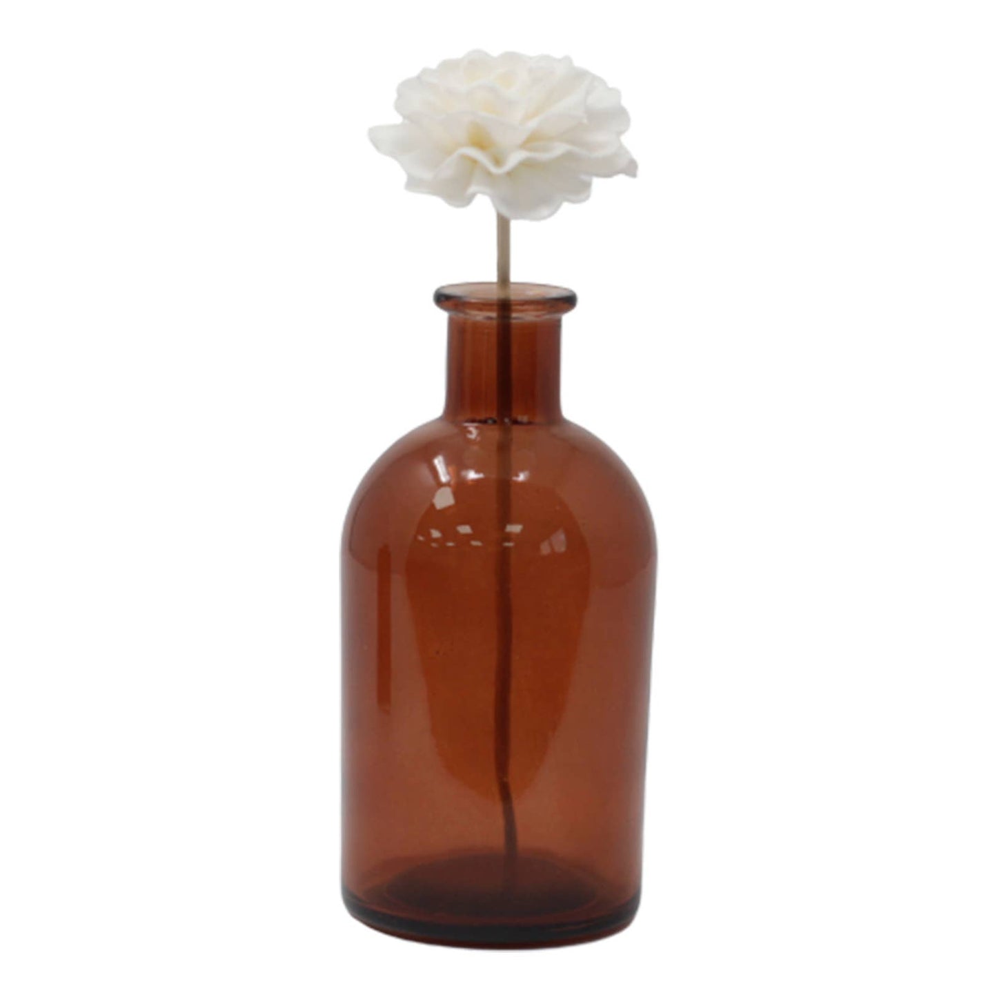 Brown glass bottle with a white flower on a white background