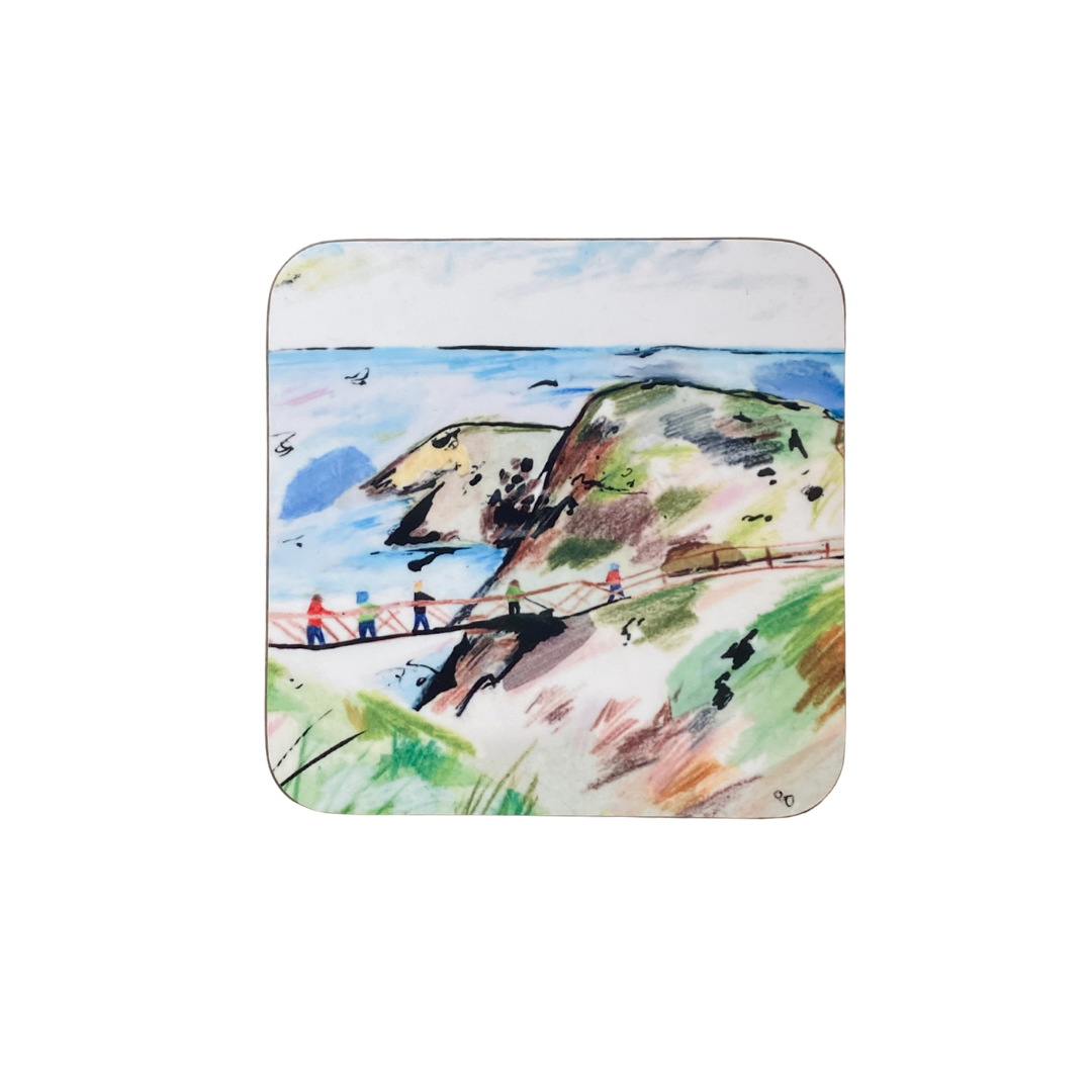 Coaster with a scenic design of people walking on a bridge over water.