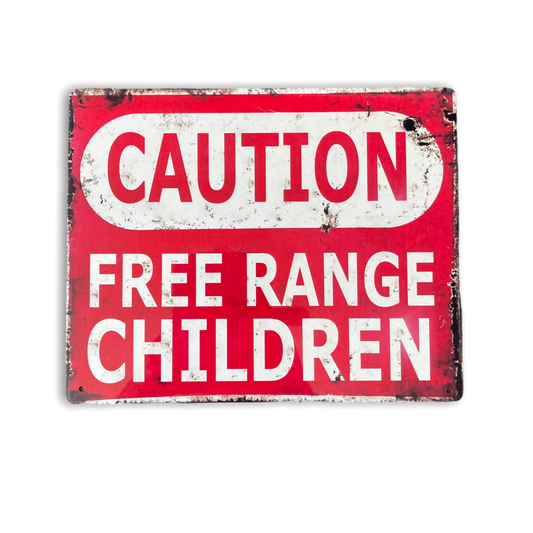 Vintage-style sign with 'Caution Free Range Children' text on a red background