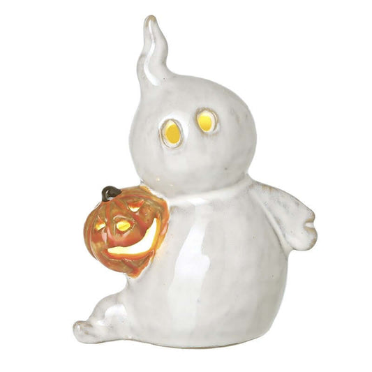 White ghost figurine holding a jack-o'-lantern on a white background