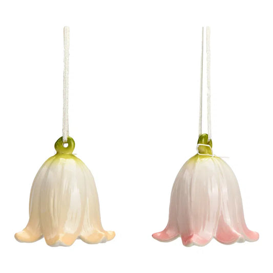 Two floral-shaped hanging lights on a white background