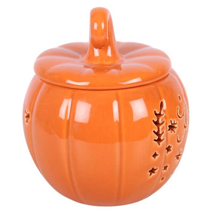 Orange ceramic pumpkin-shaped jar with a lid on a white background