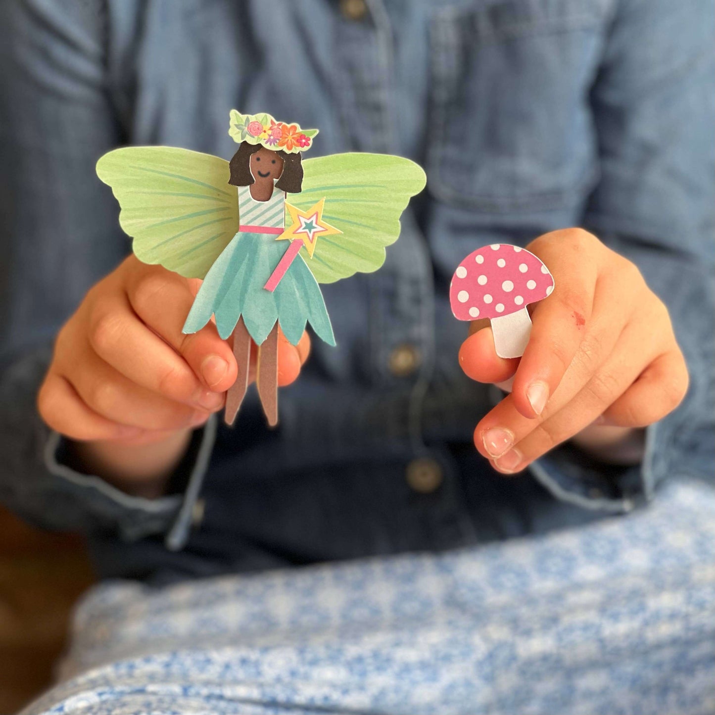 Child holding a Fairy Peg Doll-Make Your Own