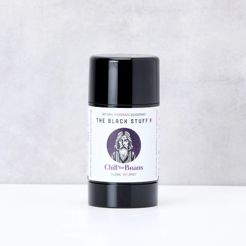 Deodorant stick labeled 'The Black Stuff' by Chill Your Boans on a white background