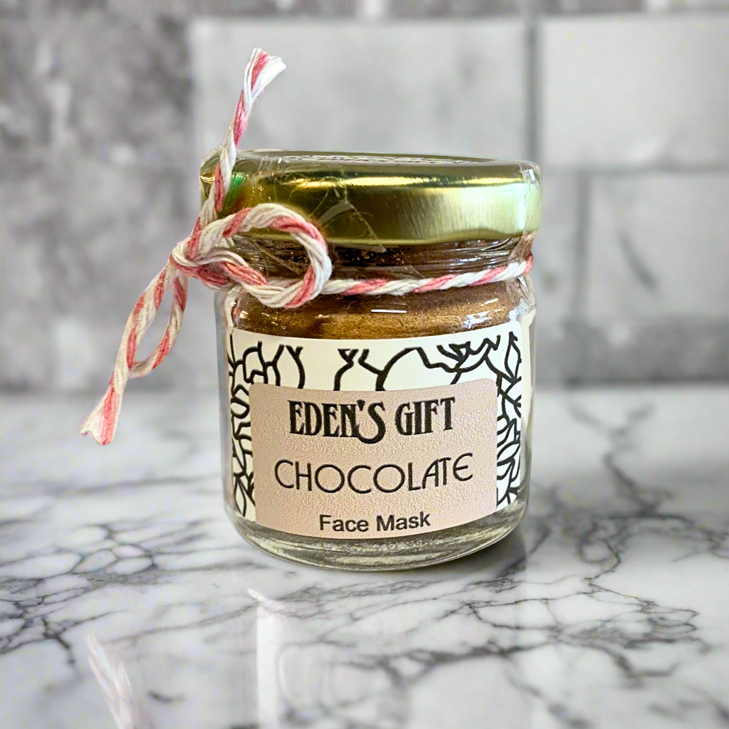 Jar of 'Eden's Gift Chocolate Face Mask' on a marble surface