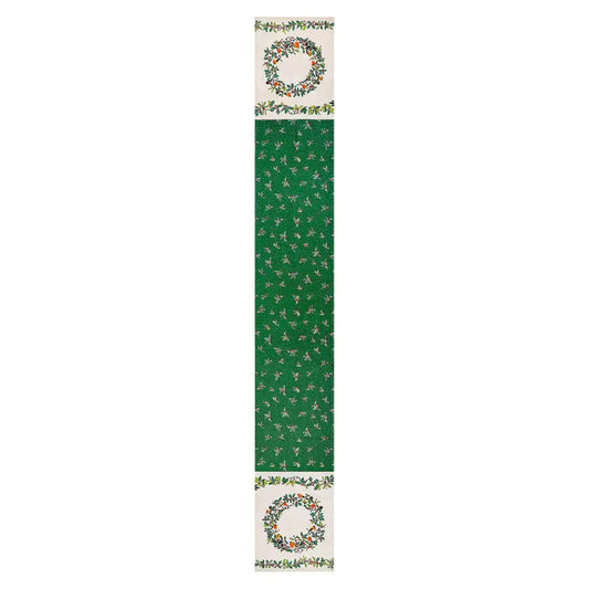 Green table runner with floral patterns on a white background