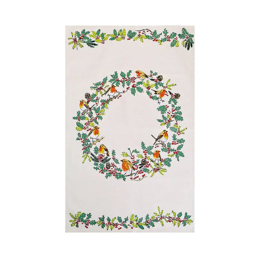 Decorative towel with a Christmas wreath design featuring birds and holly on a white background.