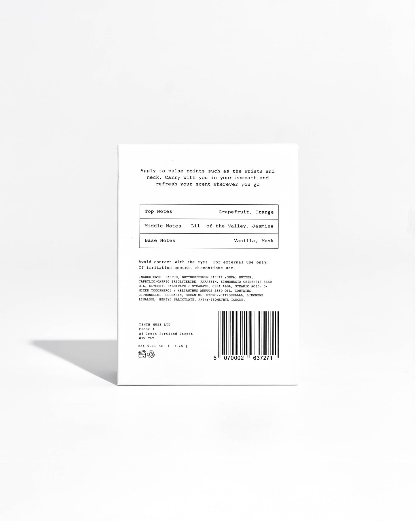 Back label of purfume product with text and a barcode on a white background