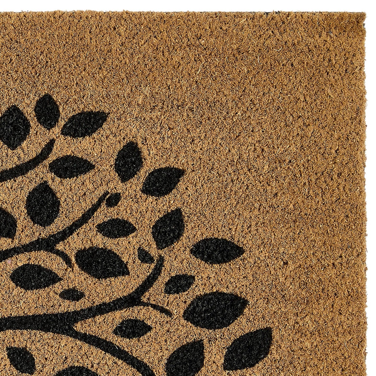 Doormat with black leaf pattern on a brown background