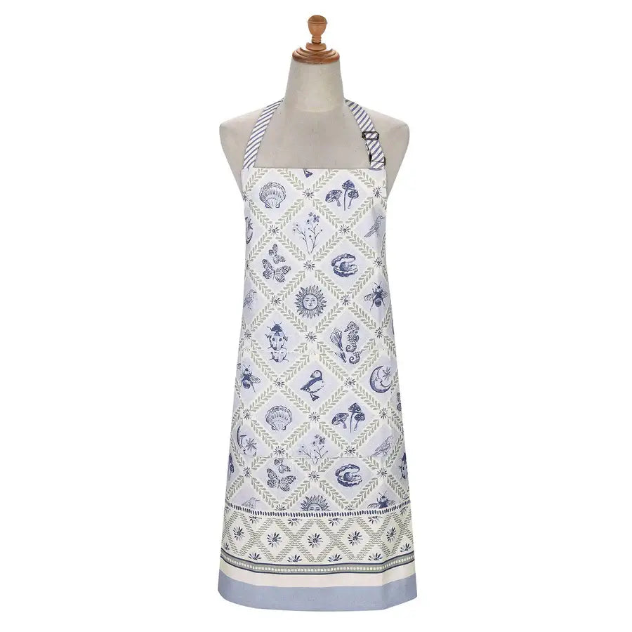 White apron with blue floral pattern on a mannequin against a white background